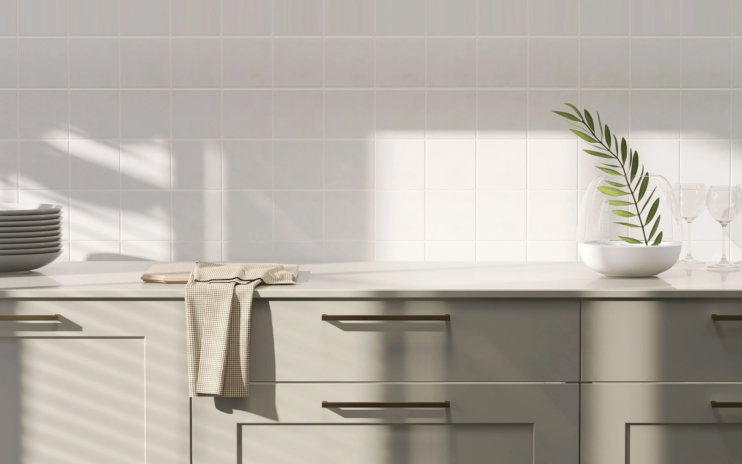 Kitchen backsplash with clean white tiles and natural light