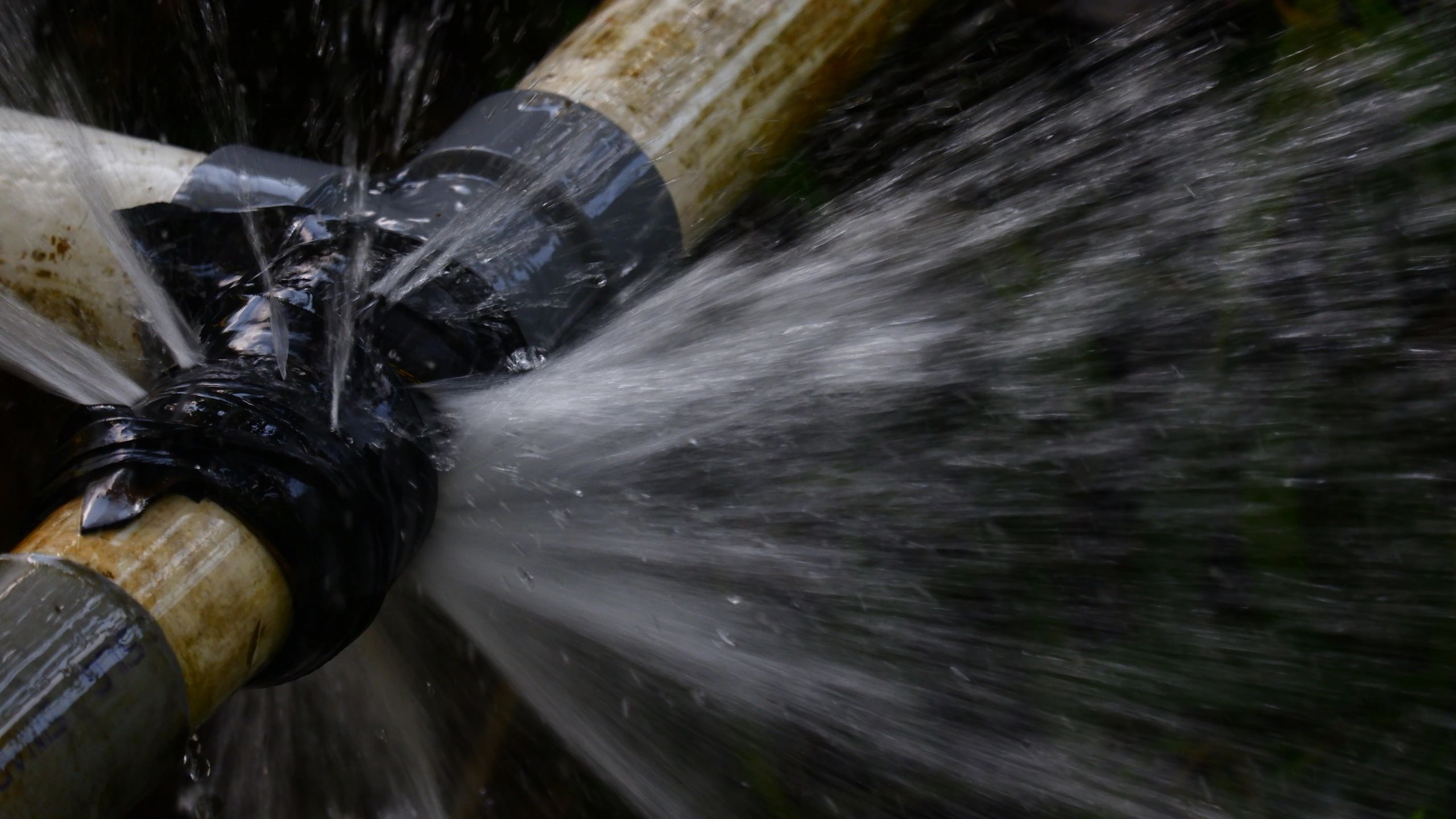 Water spraying from a leaking pipe